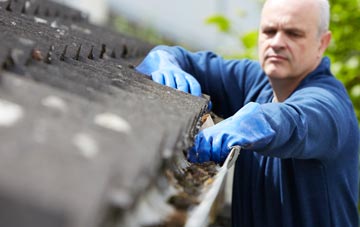 cleaning and inspecting The Row roofs